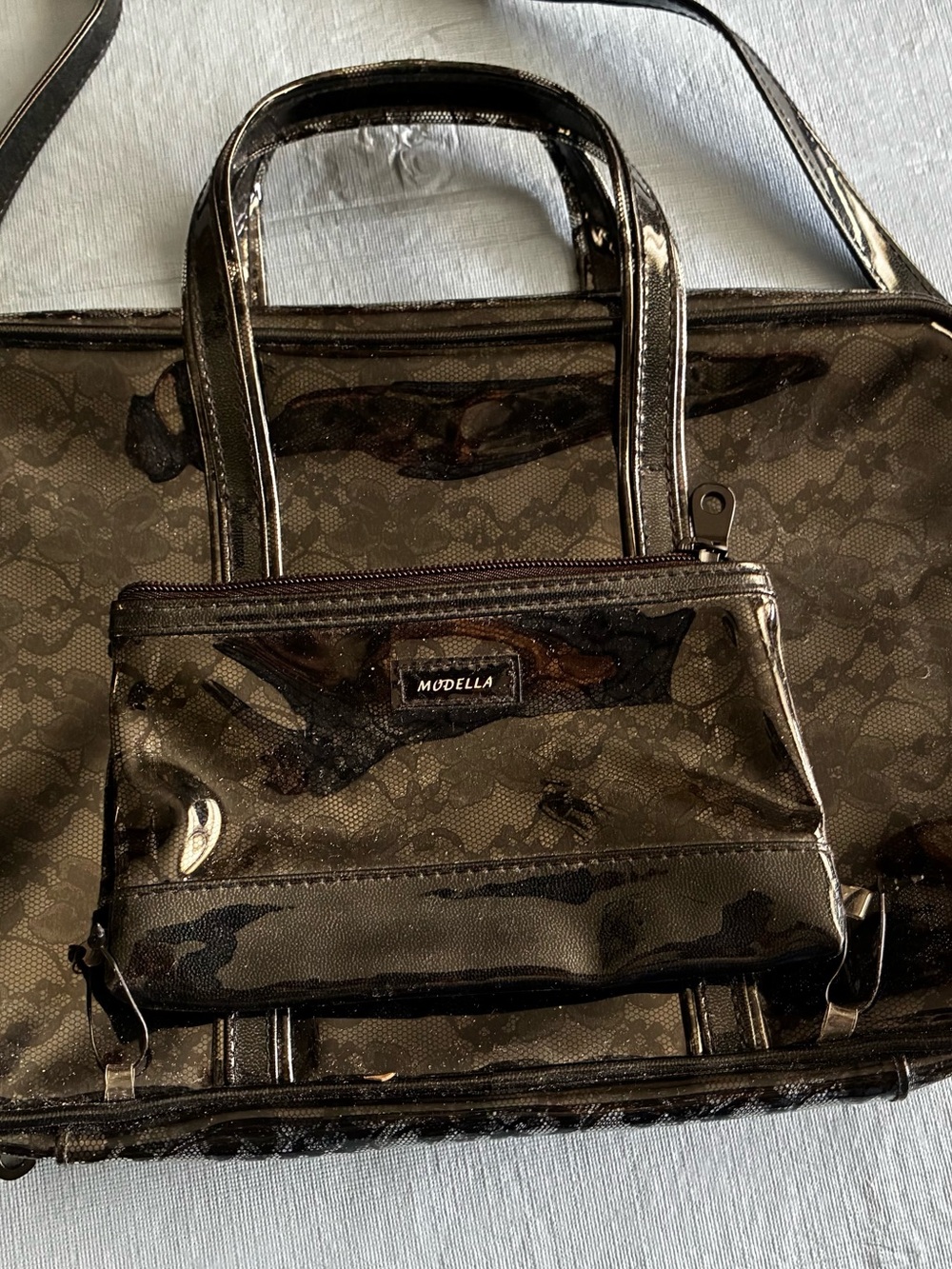 Modella clear plastic three piece cosmetic carrying case with handles